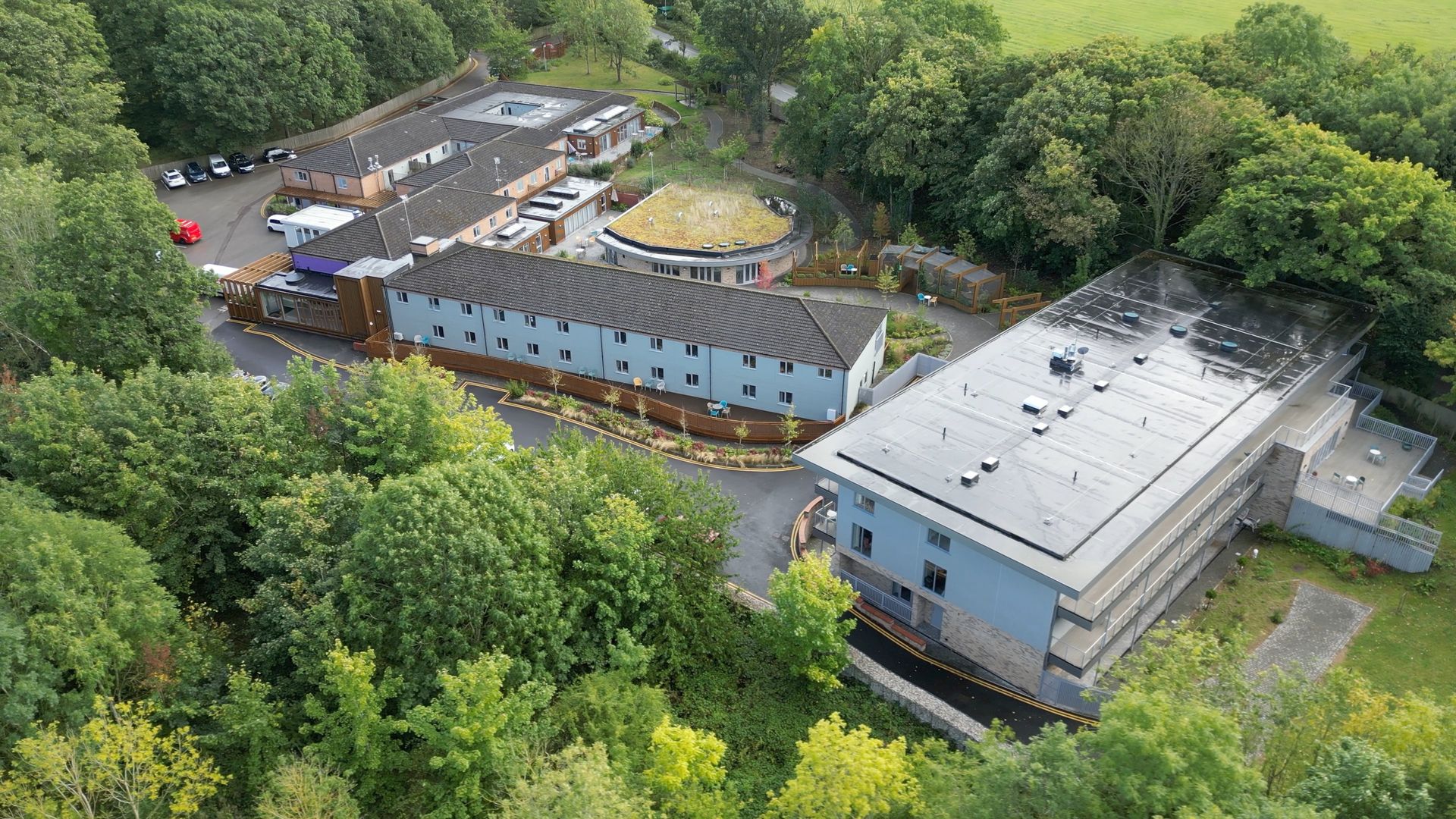 Rusticus dementia care home is set within an area of trees, creating a tranquil environment